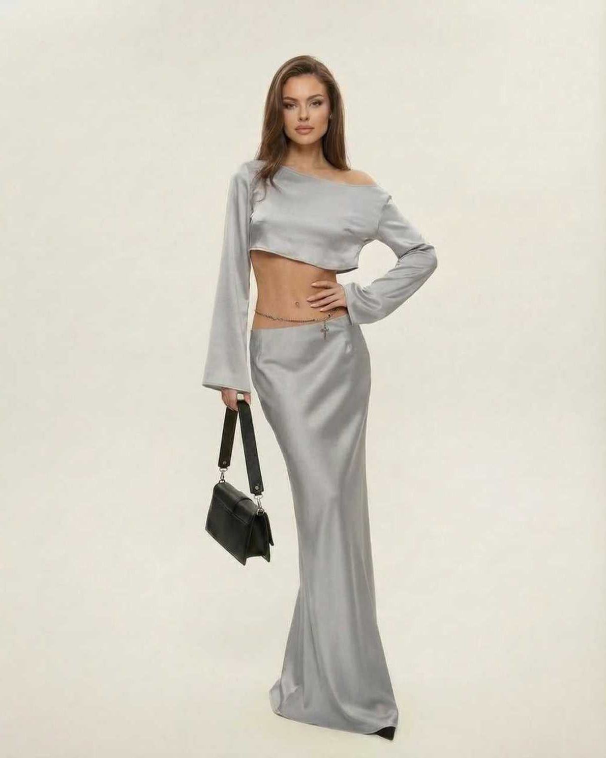 Nova Midi Dress by Lauven, featuring a chic asymmetrical design in sleek silver, perfect for elegant occasions.