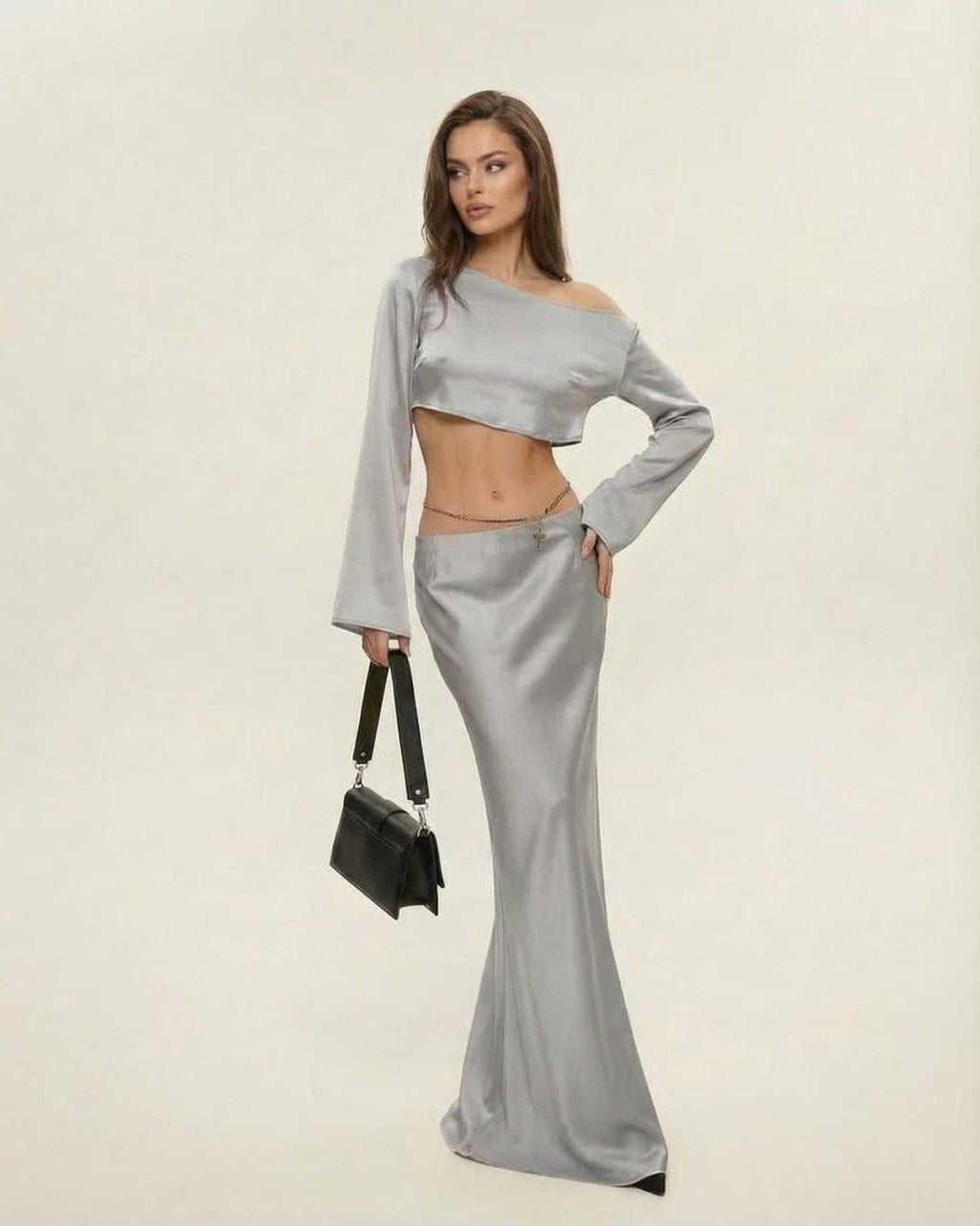 Nova Midi Dress by Lauven in sleek silver with an elegant asymmetrical silhouette and chic neckline.