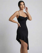 Lauven Nova Midi Dress in black showcasing elegant asymmetrical backless design and sleek slim fit.
