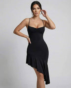 Nova Midi Dress by Lauven – Elegant black dress featuring an asymmetrical hemline and backless design.