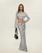 Nova Midi Dress by Lauven, featuring an elegant asymmetrical silhouette in sleek silver.