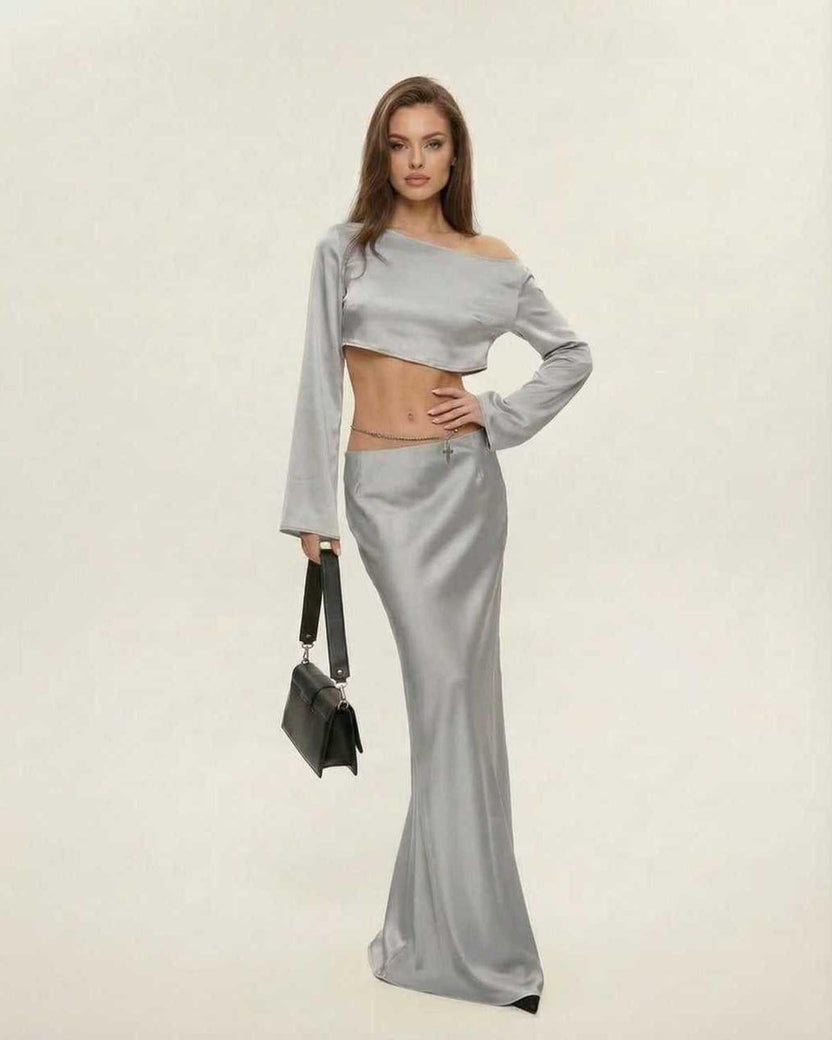 Nova Midi Dress by Lauven, featuring an elegant asymmetrical silhouette in sleek silver.