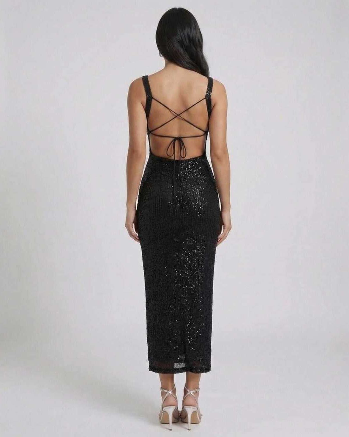 Back view of Nyra Midi Dress by Lauven showcasing its sequined elegance and stylish backless design.