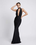 Nyx Maxi Dress showcasing black halter design with deep plunge and open back, perfect for elegant occasions by Lauven.