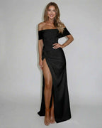 Nyx Maxi Dress by Lauven, elegant off shoulder A-line silhouette with a high slit for evening events.
