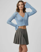 Oberon Cardigan in blue with cropped silhouette, delicate knit texture, by Lauven for a stylish, elevated look.