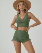 Oliva Two-Piece Swimsuit featuring a green sleeveless top and high-waisted shorts by Lauven.