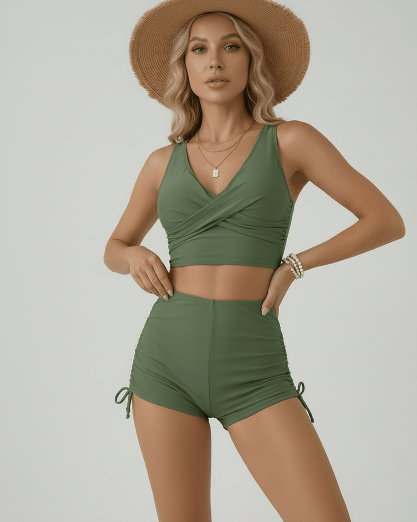Oliva Two-Piece Swimsuit featuring a green sleeveless top and high-waisted shorts by Lauven.