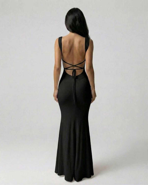 Onyx Maxi Dress by Lauven, showcasing the sophisticated strappy back silhouette in classic black.