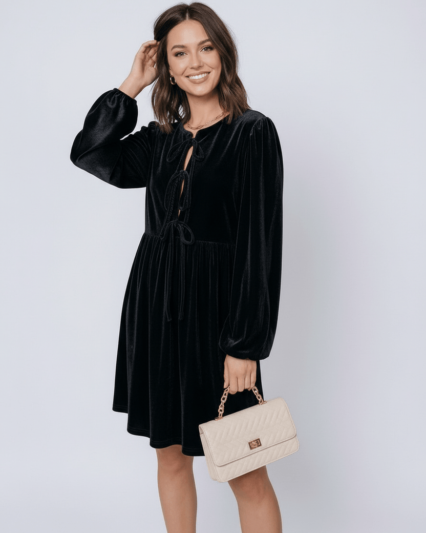 Onyx Mini Dress by Lauven, black velvet princess dress with drawstring detail and long lantern sleeves.