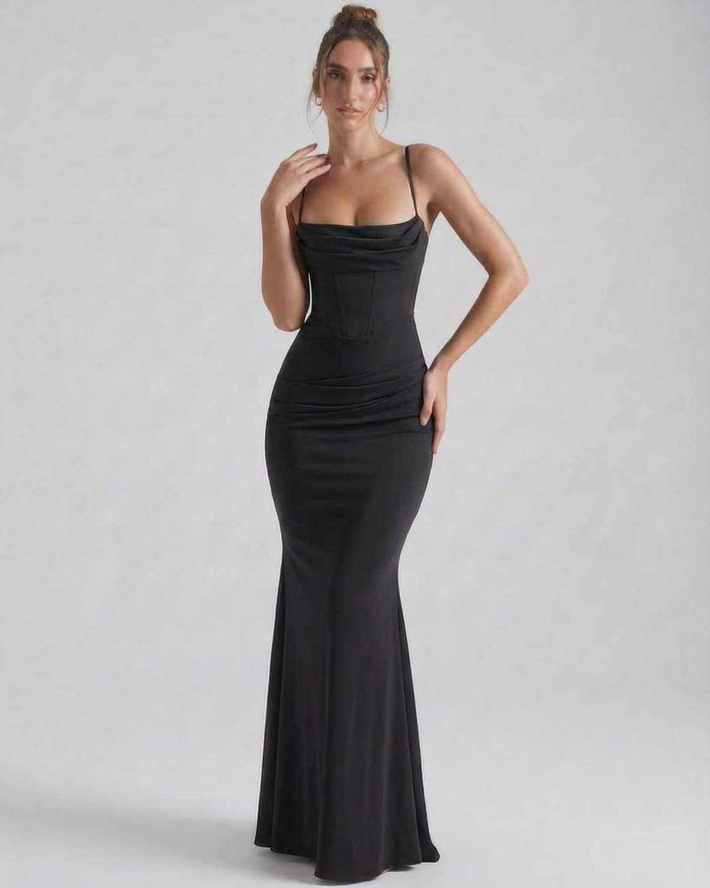 Orion Maxi Dress by Lauven, elegant sheath silhouette with sleek spaghetti straps, crafted from luxurious black fabric.