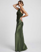 Orion Maxi Dress in green, featuring a one shoulder design and sleek satin finish by Lauven.