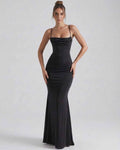Orion Maxi Dress in sleek black, featuring spaghetti straps and a flattering sheath silhouette by Lauven.
