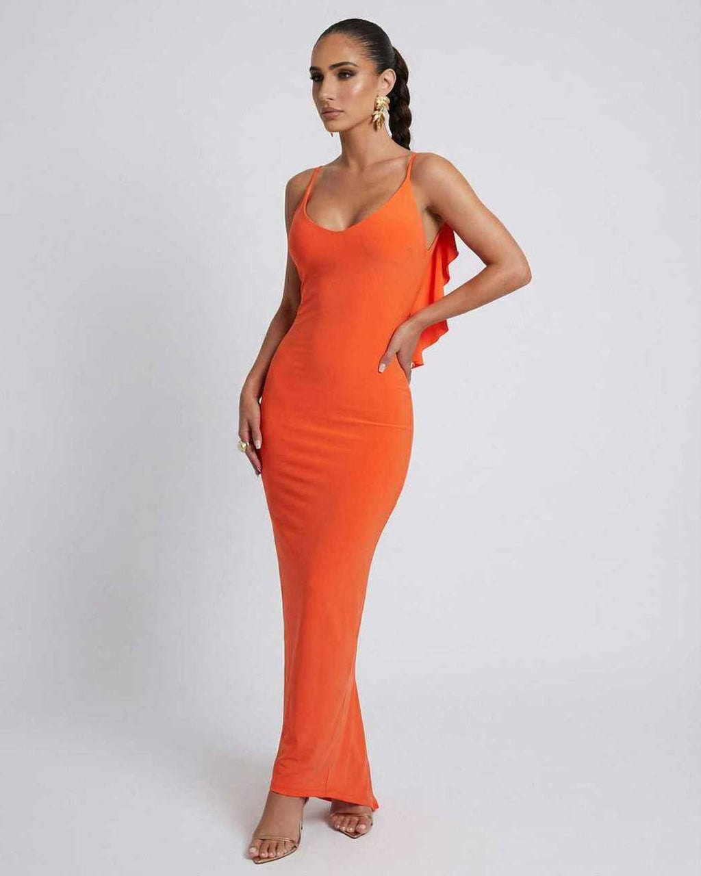 Lauven Orion Maxi Dress in sleek orange, sleeveless bodycon silhouette, perfect for fashion-forward occasions.