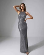 Orion Maxi Dress showcasing a silver sequin design with halter neck, sleek silhouette by Lauven for elegant evening wear.