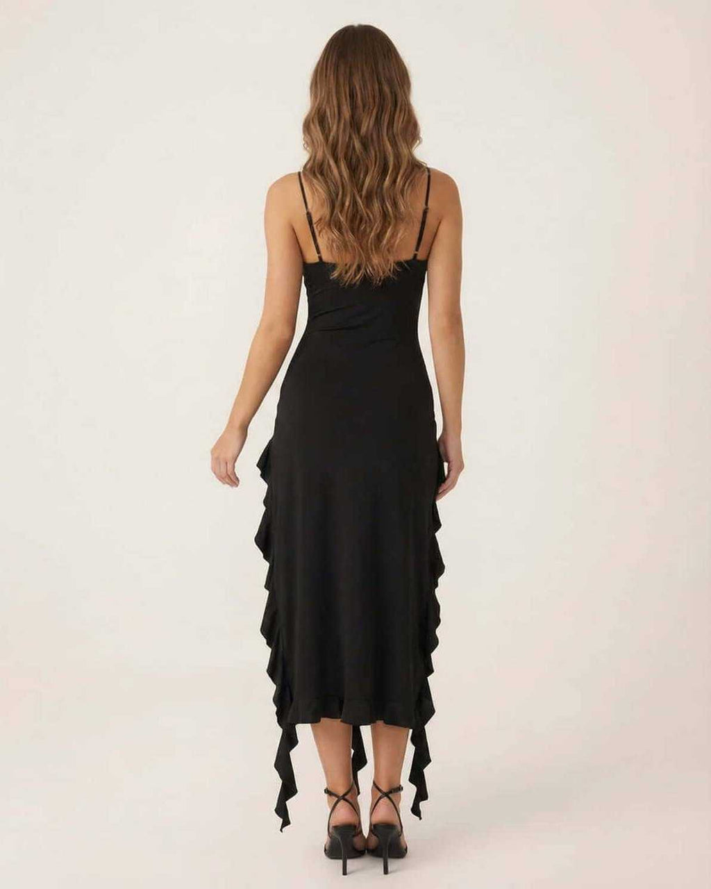 Back view of the stylish Orion Midi Dress by Lauven with elegant ruffle details.
