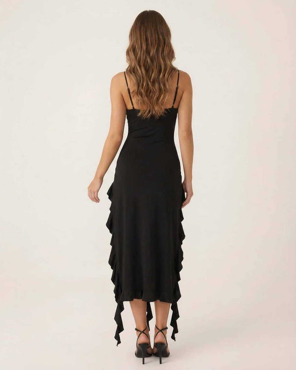 Back view of the stylish Orion Midi Dress by Lauven with elegant ruffle details.