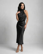 Orion Midi Dress showcasing satin halter neck elegance and modern allure by Lauven, perfect for refined occasions.