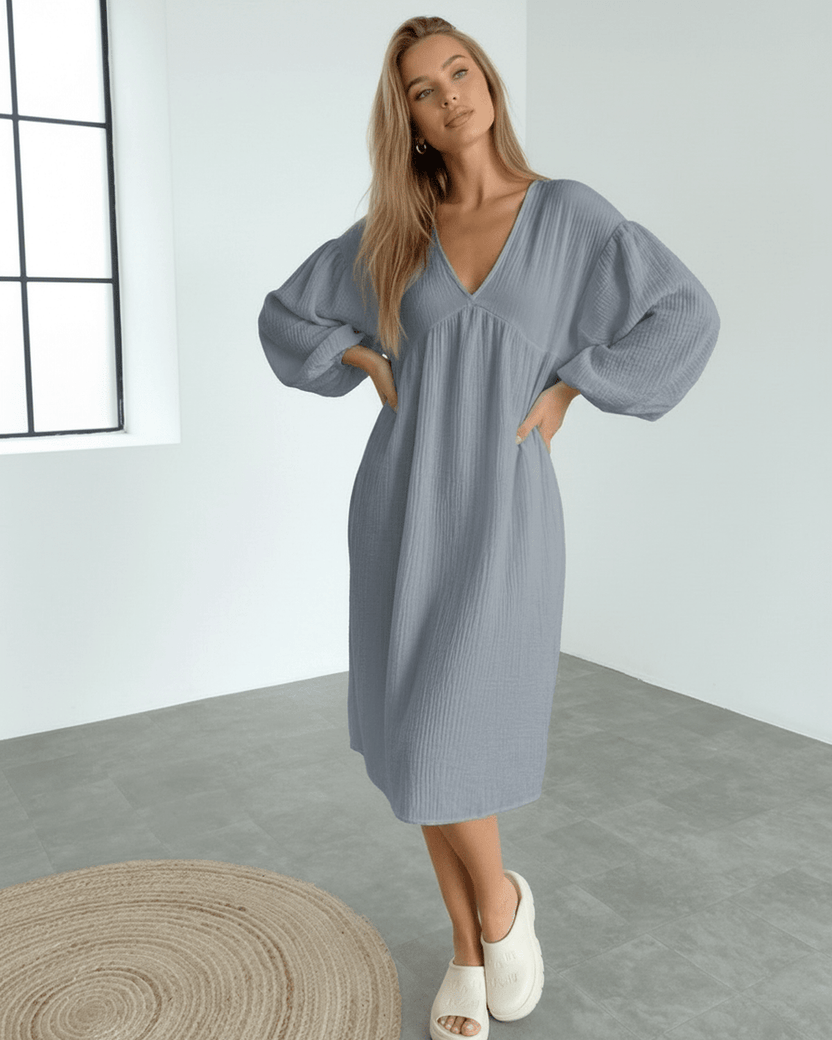 Orion Midi Dress in gray cotton featuring puff sleeves, offering modern elegance and comfort by Lauven.
