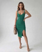 Orion Midi Dress – Elegant green sheath with side slit, flattering fit by Lauven for timeless sophistication.