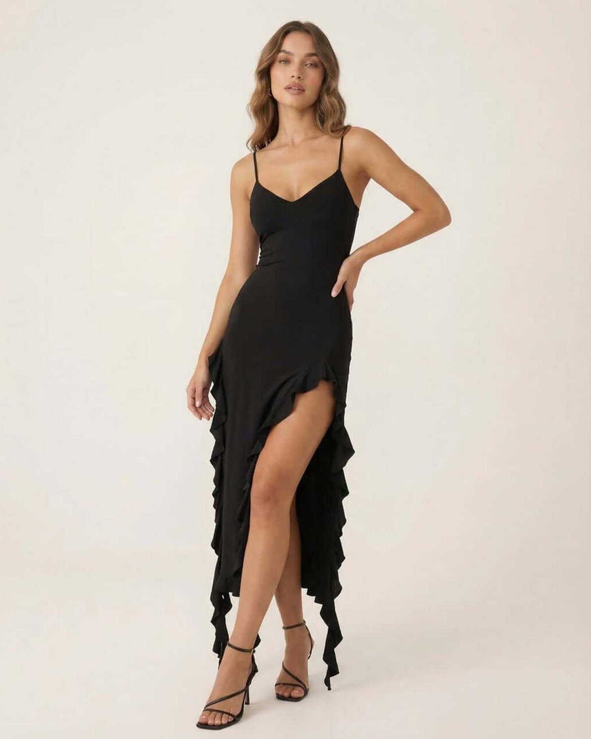 Orion Midi Dress by Lauven featuring elegant ruffle details and a flattering silhouette in black.