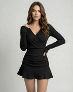 Orion Mini Dress by Lauven, elegant ribbed black knitwear, deep V-neckline, sleek silhouette for refined occasions.