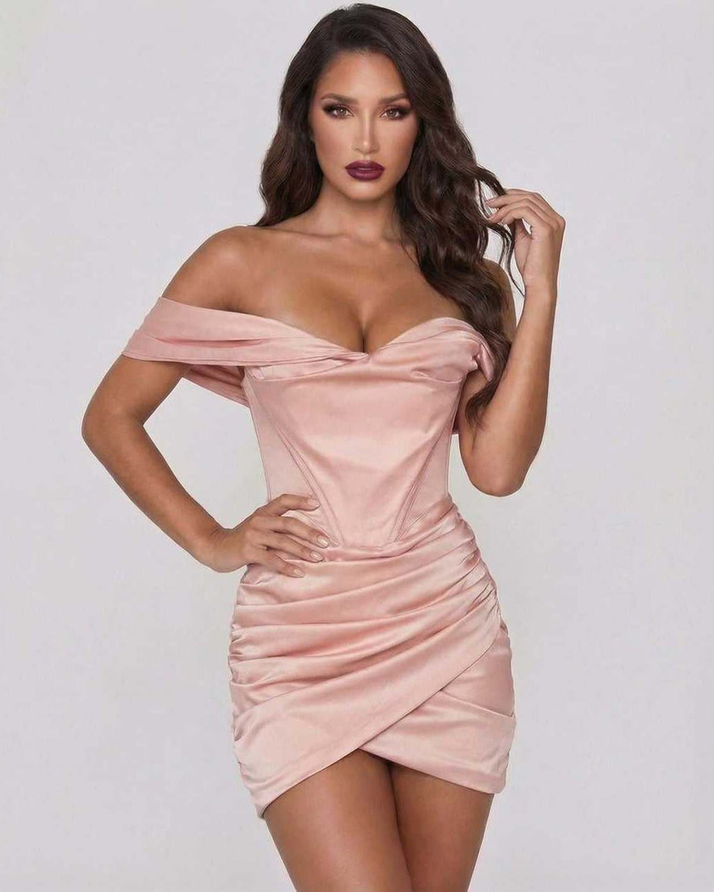 Orion Mini Dress by Lauven - Elegant blush satin off-shoulder silhouette with draped design and soft sheen.