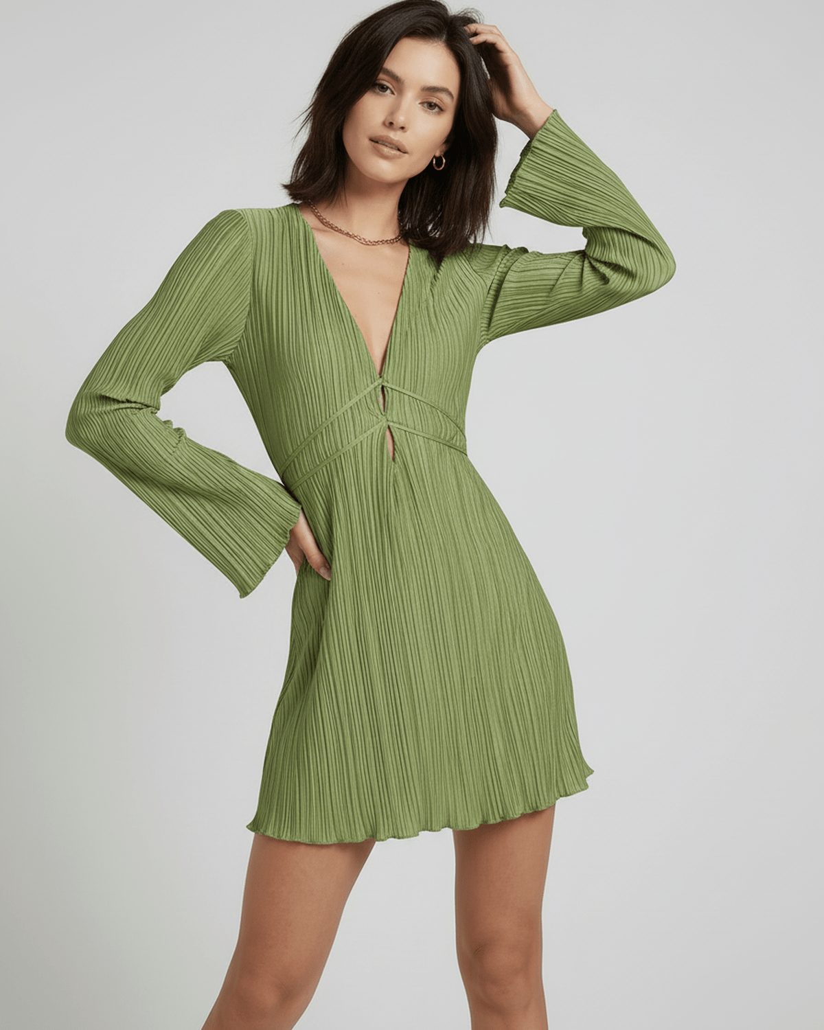 Orion Mini Dress by Lauven in olive green with pleated long sleeves and a deep V-neckline.