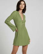 Orion Mini Dress by Lauven in olive green with pleated design and deep V-neckline.