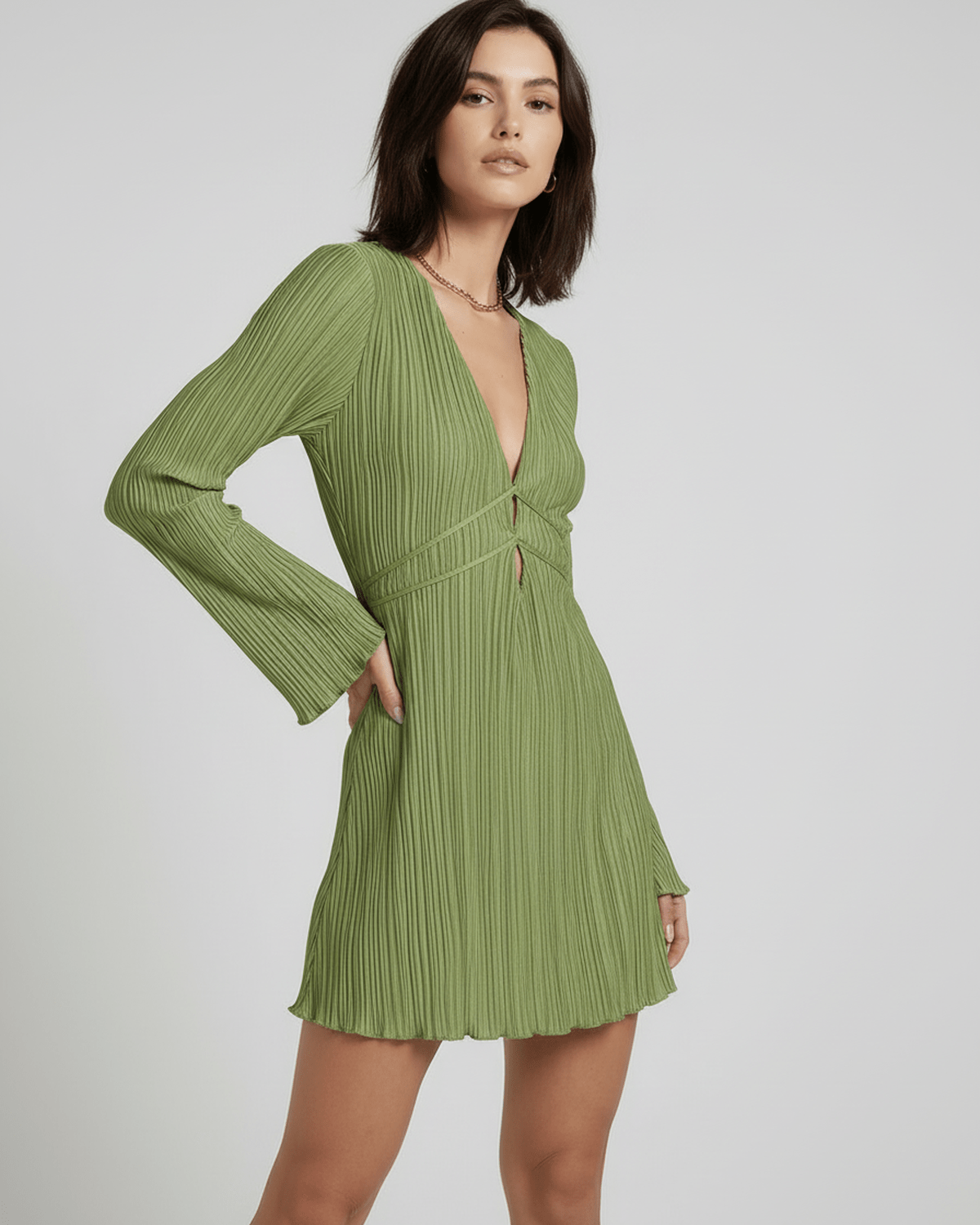 Orion Mini Dress by Lauven in olive green with pleated design and deep V-neckline.