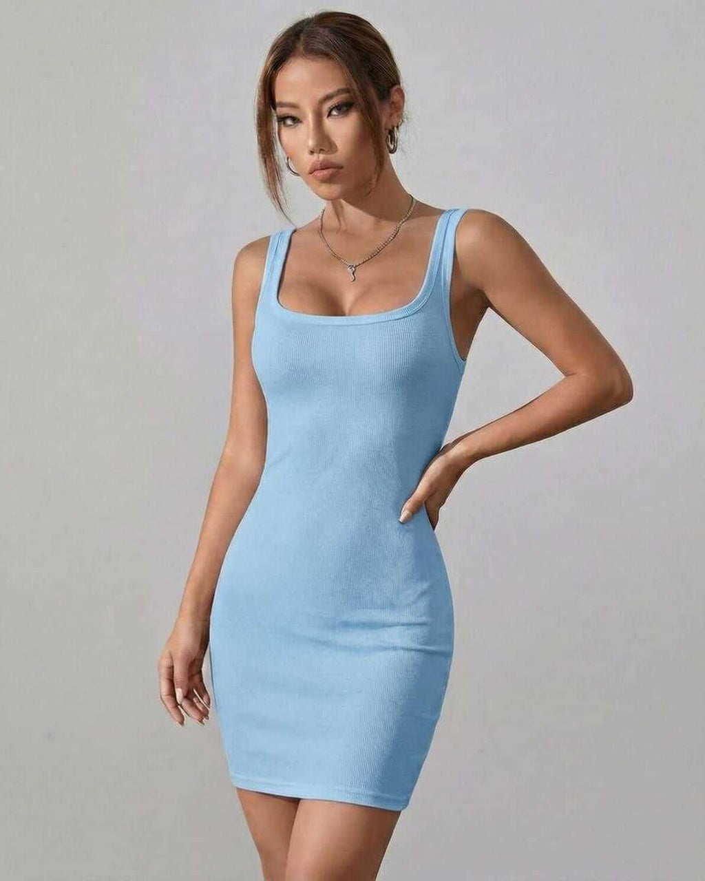 Orion Mini Dress by Lauven in soft blue ribbed fabric, featuring a sleek silhouette and square neckline.