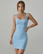 Orion Mini Dress by Lauven in soft blue ribbed fabric, showcasing a modern body-skimming silhouette.