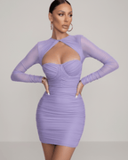 Orion Mini Dress by Lauven in soft lavender with sheer long sleeves and sleek sheath silhouette.