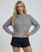 Orion Sweater from Lauven, a women’s cable-knit ribbed sweater in gray, perfect for fall and winter styling.