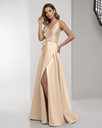 Orlena Maxi Dress, champagne satin A-line design, wrap slit, bow waist, elegant and refined by Lauven.