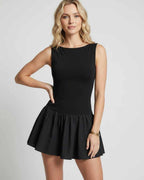 Vesper Mini Dress by Lauven — stretch knit sleeveless bateau neck drop waist pleated mini dress