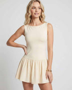 Vesper Mini Dress by Lauven — stretch knit sleeveless bateau neck drop waist pleated mini dress