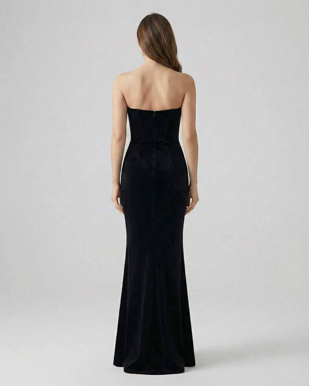 Elegant back view of the Celeste Maxi Dress by Lauven, a strapless black velvet evening gown with a timeless silhouette.