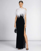 Celeste Maxi Dress by Lauven featuring a feathered halter neckline and sleek black silhouette.