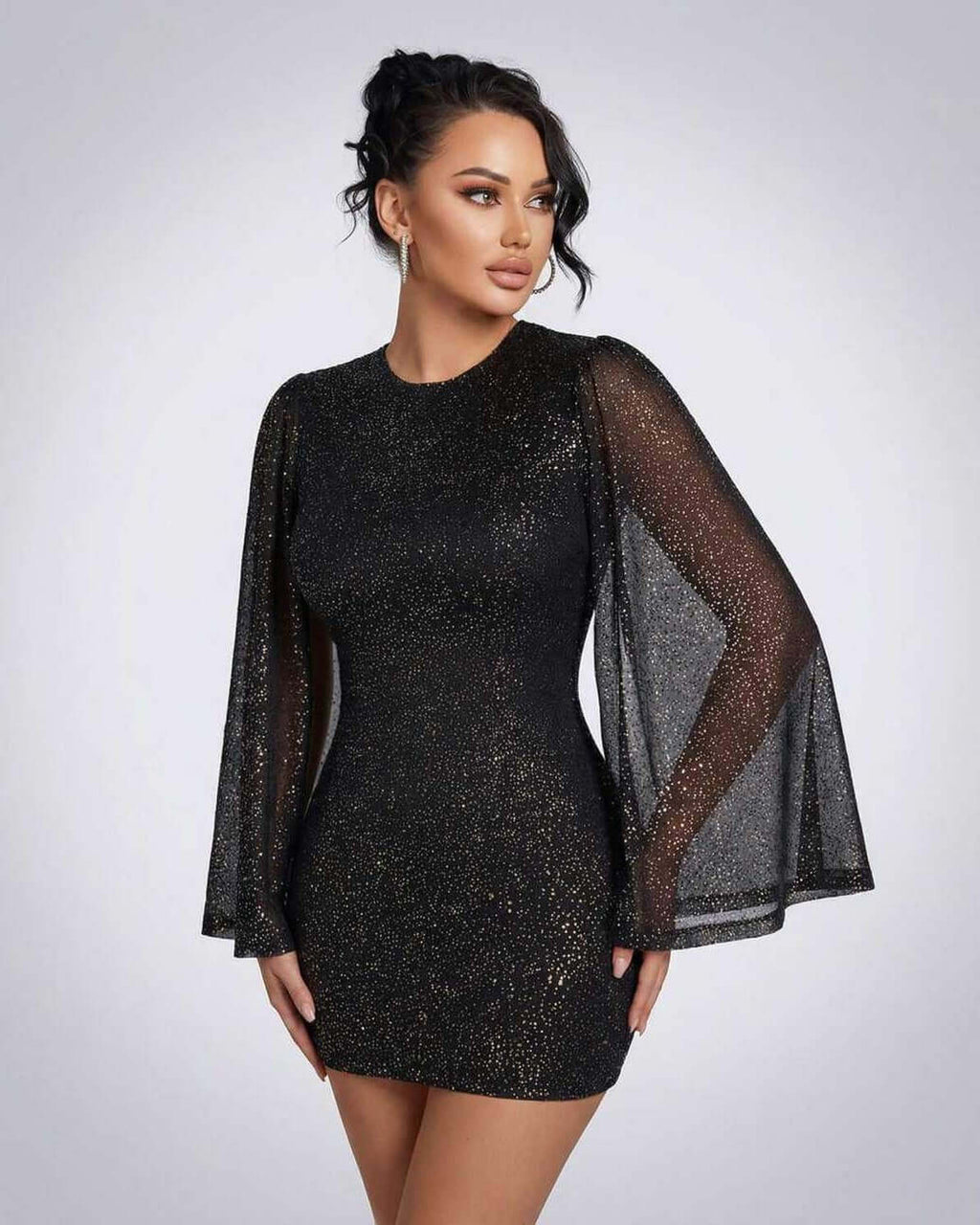 Celeste Mini Dress by Lauven featuring sheer cloak sleeves and sparkling dot pattern for an elegant look.
