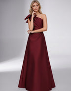 Celestia Maxi Dress by Lauven — satin one shoulder A-line maxi dress with bow