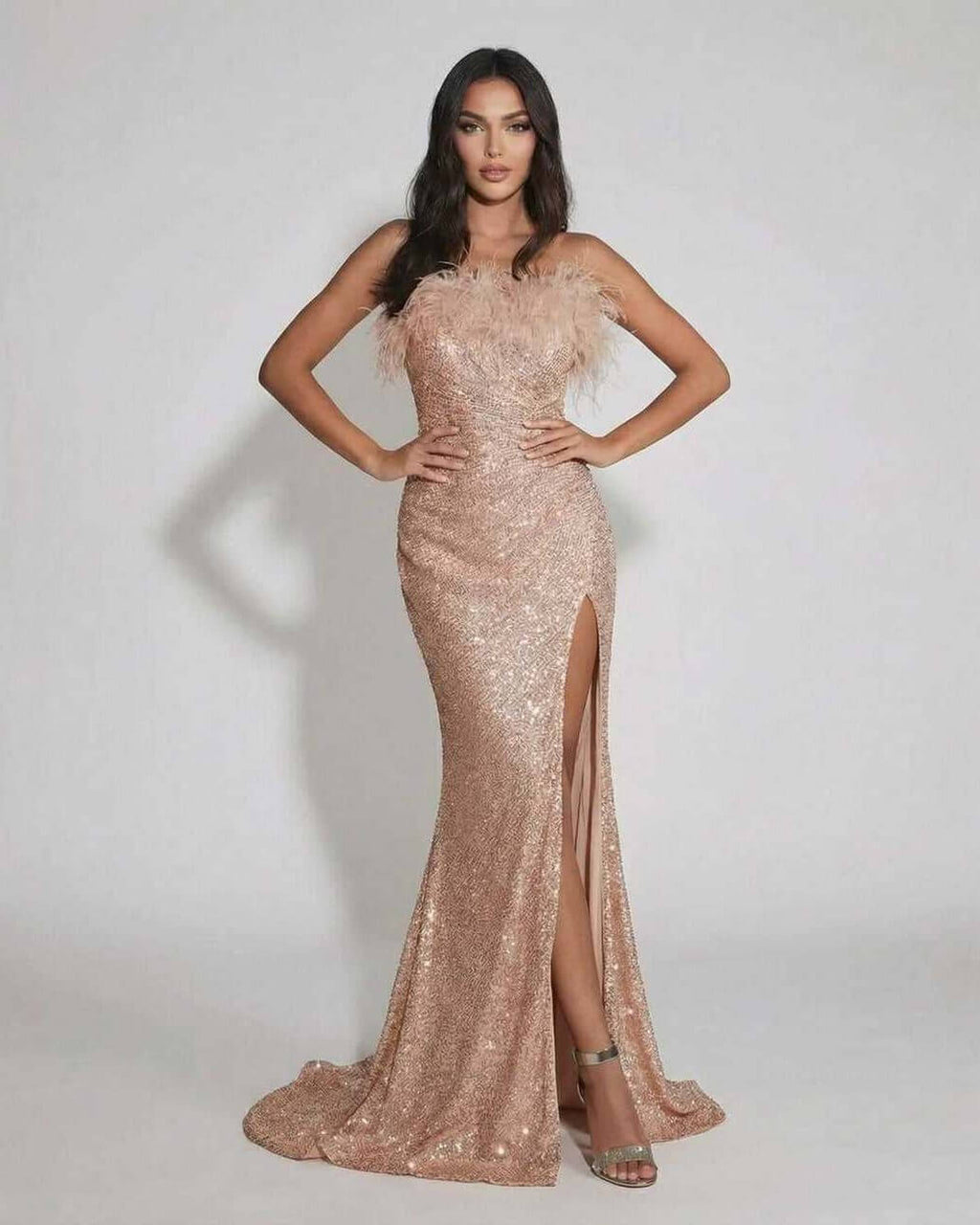 Blush Maxi Dress by Lauven, luxurious sequin off the shoulder evening gown with feather detail and elegant fit.