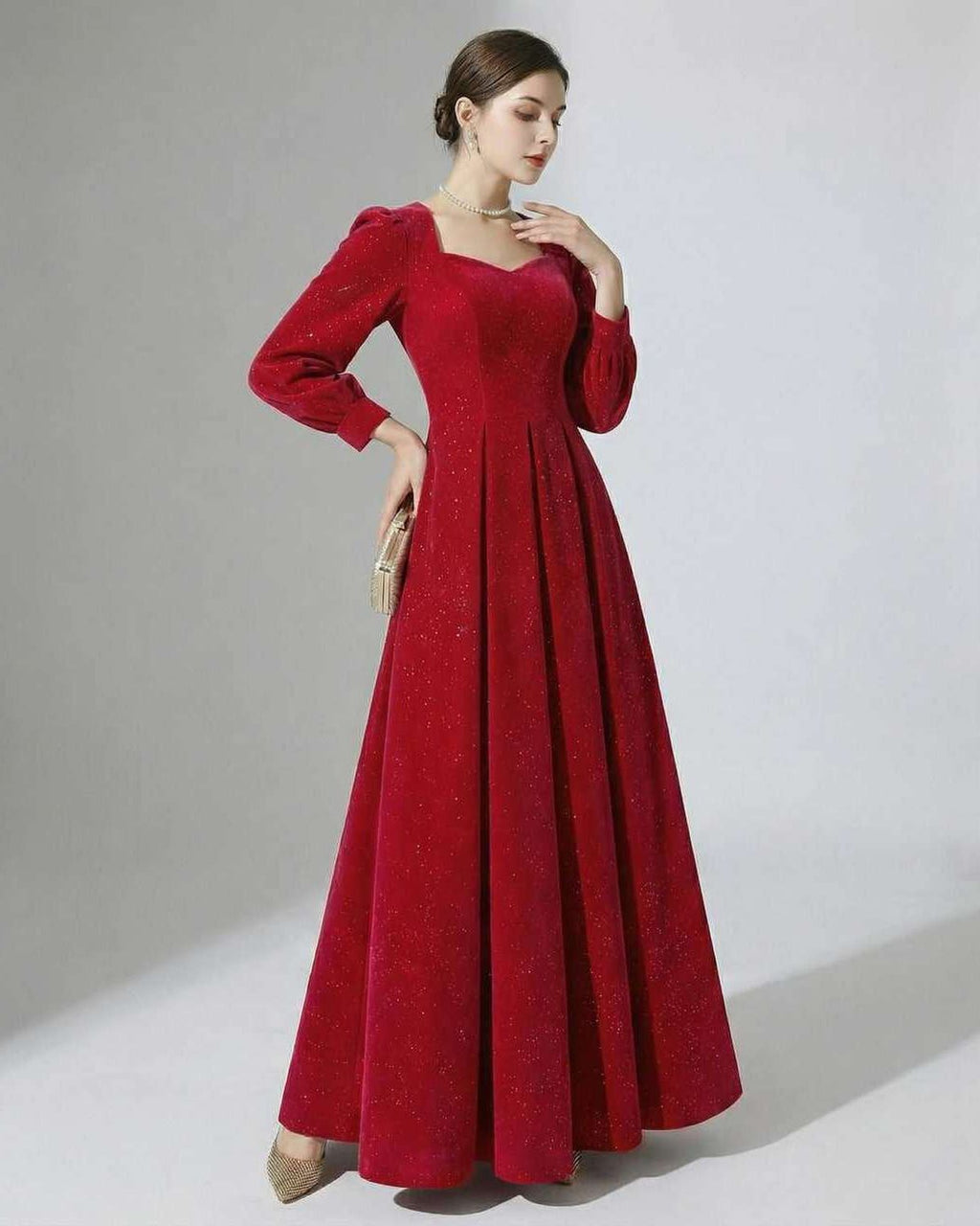Celeste Maxi Dress by Lauven, elegant red A-line velvet gown with puff sleeves and subtle glitter accents.