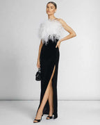 Celeste Maxi Dress by Lauven, featuring a feathered halter neckline and sleek black silhouette.