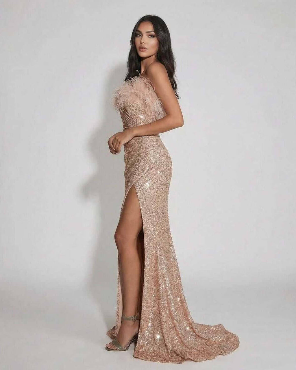 Blush Maxi Dress by Lauven, luxurious blush sequin off the shoulder gown with feather detail.