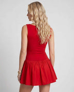 Vesper Mini Dress by Lauven — stretch knit sleeveless bateau neck drop waist pleated mini dress