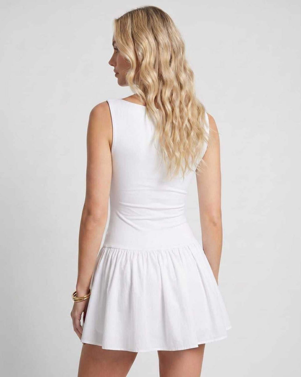 Vesper Mini Dress by Lauven — stretch knit sleeveless bateau neck drop waist pleated mini dress