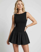 Vesper Mini Dress by Lauven — stretch knit sleeveless bateau neck drop waist pleated mini dress