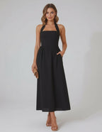Elara Midi Dress - Elegant black halter midi dress with A-line silhouette for refined modern style by Lauven.