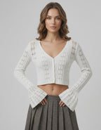 Elara Cardigan with cropped silhouette, openwork knit, V-neckline, by Lauven in elegant white.